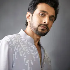 One glance, and the room is his. A close-up of Pratik Gandhi, effortlessly suave and exuding charm in my grey embroidered kurta.