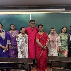 Prof. Dashrath Parab with some of our wonderful female faculty members during the Satyanarayan Pooja. Our teaching team is the backbone of our students' success.