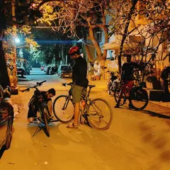 A candid moment during our Republic Day ride, with one cyclist checking on his bike. We casually ride through quiet lanes, but we always make sure our gear is in check and we look out for one another.