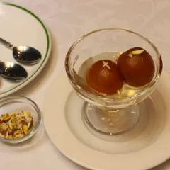 Savour the melt-in-your-mouth delight of Gulab Jamun, an irresistible treat waiting for you.