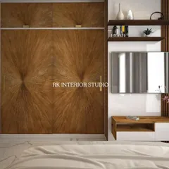 A 3D render of a bedroom TV unit and wardrobe. I designed this with a beautiful starburst veneer pattern on the wardrobe doors, making it a stunning focal point.