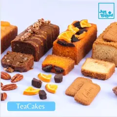 A beautiful spread of our signature eggless teacakes. From Orange Chocolate to Coffee Pecan, each one is moist, fluffy, and perfect with a cup of tea.