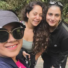 Smiles during a guided nature walk. These walks are a core part of the experience, helping you tune into the earth's rhythm and enjoy the simple pleasure of being outdoors.