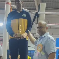 Mohit Kumaran R. on the podium after winning a Silver Medal at the CISCE National Boxing Championship. Competing at the national level requires immense heart and discipline.