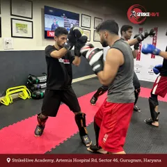 Partner drills are essential for developing timing and reflexes. Our students practice offensive and defensive striking combinations, building muscle memory and practical combat skills.