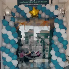 For the 4th anniversary of Ripplr, I created this balloon arch at their main entrance. The blue, white, and silver color scheme was chosen to match their corporate branding, welcoming employees and visitors to the celebration.