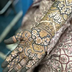 A close-up of the groom's name, 'Shahan', written in elegant Urdu calligraphy on bride Tasmiya's arm.