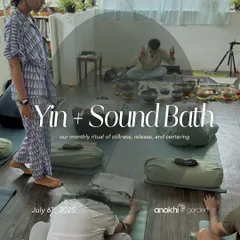 Participants relax in a supported pose during our monthly Yin + Sound Bath ritual. This session is a moment of stillness, release, and centering, perfect for anyone needing to take a break from city life.