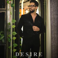 Black, worn like a weapon. This all-black designer shirt features subtle, tone-on-tone embroidery of a phoenix, a symbol of rebirth and power. It is for the man who owns the room without saying a word.