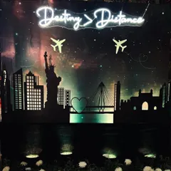 We created this personalized backdrop for a couple with a long-distance love story. The sign 'Destiny > Distance' is set against a skyline merging Mumbai and New York, telling their story visually.