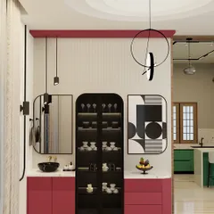 This crockery and bar unit was designed to be a statement piece. The bold magenta, balanced with white fluted panels and a quartz countertop, creates a vibrant look. I added custom abstract art and suspended lights to complete this modern and functional corner.