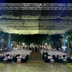 For this Sangeet, we transformed an outdoor space into a celestial wonderland. A vast canopy of thousands of fairy lights created a star-studded sky, setting a dreamy, glamorous tone for a night of celebration and dance.