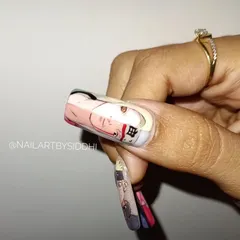 A close-up of the thumb nail from my Naruto-themed set, featuring a hand-painted portrait of Gaara. I focus on capturing the character's distinct features and expression.
