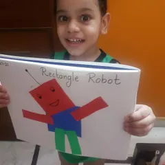 I love seeing the proud smile on a child's face after they complete a project. We made this 'Rectangle Robot' to learn about shapes in a creative way, showing how everyday objects are made of simple geometric forms. This is a key part of our general knowledge curriculum.