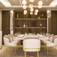 A dining space featuring a dark wood accent wall with built-in shelving for displaying decor, adding warmth and sophistication.