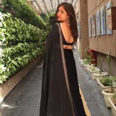 A classic black saree is always a good idea. This look is perfect for an evening Sangeet or reception, giving off elegant and timeless vibes.