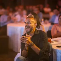 The face of pure delight. This gentleman's reaction captures the fun and energy of the show. It's these moments of shared joy that make every performance special.
