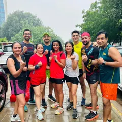The tribe after a rainy day run. Bad weather is just another challenge to conquer. We show up, no matter what.