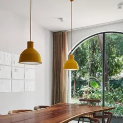 The perfect setup for our next meeting. The live-edge wooden table, modern chairs, and bold pendant lights create an inspiring environment for creative discussions.