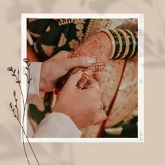 A close-up shot of the ring being placed on the finger. I focus on capturing the intricate details, from the beautiful henna to the design of the ring itself.