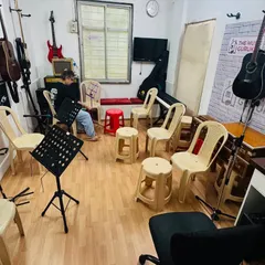 The classroom is set up and ready for a group lesson. We ensure our learning spaces are organized, comfortable, and inspiring to help students focus on their music.
