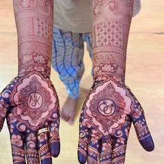 The result of my organic henna paste after two days. This beautiful deep stain is what I always aim for, and I was so happy to personalize this engagement mehendi with the couple's initials.