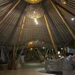 The soaring, cathedral-like roof of this bamboo structure in Bali is both awe-inspiring and deeply connected to nature.