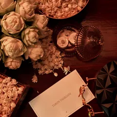 The details matter. An invitation and accessories from a Tarun Tahiliani show, a designer known for his impeccable craftsmanship and modern take on Indian heritage.