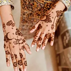 A whimsical and modern Eid design featuring moons, clouds, stars, and hanging lanterns. The "Eid Mubarak" in beautiful calligraphy adds a special festive greeting.