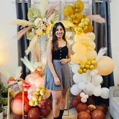 A happy client enjoying her beautiful boho-themed birthday setup. Seeing my clients smile is the ultimate reward for all the hard work and passion I pour into my events.