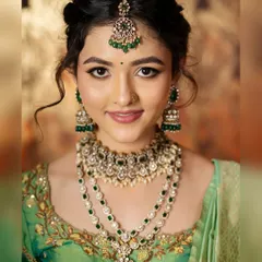 Another detailed shot of the traditional styling, focusing on the layered necklaces, maang tikka, and flawless makeup.