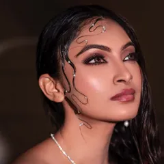 A different angle from our wet-look series, focusing on the artistic placement of the pearl-adorned hair strands. The upward gaze and soft lighting add a dreamy, ethereal quality to the image.