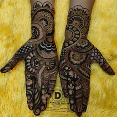 A classic Indo-Western design with a mix of paisleys, floral motifs, and geometric patterns, covering the hand beautifully.