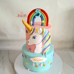 A magical two-tier unicorn cake for a 5th birthday! Megha ordered this for her unicorn-loving daughter, and I crafted this whimsical masterpiece with pastel colors, a rainbow, and a beautiful unicorn.
