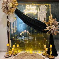 Another look at a sophisticated at-home boho decoration, showing how a simple corner can be turned into a stunning photo backdrop.