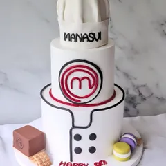Officially 9 and already cooking up greatness! This MasterChef-themed cake features the iconic logo, a chef's hat, and uniform, perfect for a young culinary star.