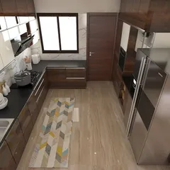 An overhead view of the L-shaped kitchen layout, demonstrating efficient use of space with ample counter area and well-organized cabinetry.
