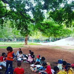 We find a quiet spot under the trees in the park for some nature journaling. These sessions encourage children to slow down, observe closely, and document their surroundings.