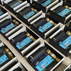 This bulk order combines practical tech with treats. Each box includes headphones, a water bottle, and chocolates, making it a perfect, well-rounded gift for employees or clients.