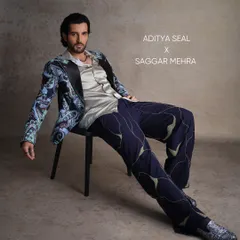 For Aditya Seal's feature in FHM India, I created this printed tuxedo to merge semi-formal sophistication with a relaxed charm. The look features a vibrant paisley print, a satin lapel, and uniquely patterned trousers, showcasing a bold approach to modern tailoring.