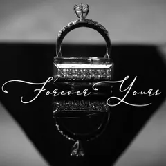 A beautifully styled and artistic shot of the wedding rings. The reflection and elegant script create a timeless image symbolizing your union.