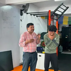 Learning the Heimlich maneuver. This first aid course covers essential procedures for common emergencies like choking, ensuring our gym is a safer place for everyone.