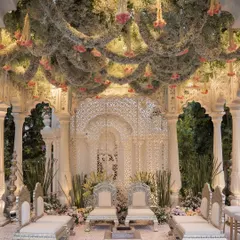 The full view of this magnificent mandap, where a ceiling of lush florals cascaded over the couple. I designed this space to feel like a sacred garden, with every detail curated for their forever moment.