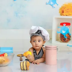 Caught mid-snack. This adorable chef couldn't resist a little taste test while cooking up some fun in the studio kitchen.