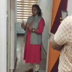 Here, I am using dowsing rods to check the energy flow in a client's space. This is a crucial first step in my process, allowing me to scientifically identify areas of negative energy or geopathic stress before recommending a precise Vastu or energy correction.