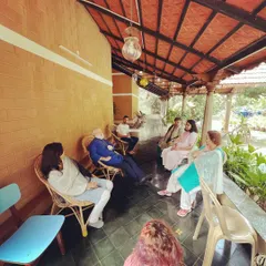 A relaxed and joyful time after a Sunday Satsang at our retreat. After meditation and chanting, we love to simply sit together, chat, and enjoy the peaceful atmosphere and good company.