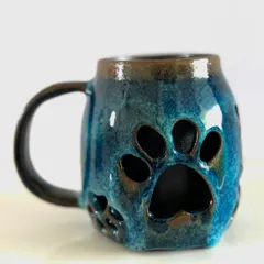For all the pet lovers out there, this is a double-walled paw mug I created. This design keeps your drink warm while the outside stays comfortable to hold, combining my love for animals and functional art.
