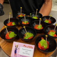A tray of my signature Prawns Koliwada with mint chutney. These bite-sized portions are perfect for passing around at cocktail parties and corporate mixers.