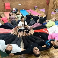 The bond formed during our teacher training is for life. This "human circle" pose, Matsyasana (Fish Pose), symbolizes the unity and support within our YTTC group.