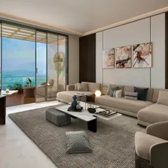 This Chattarpur farmhouse interior is defined by clean lines and a serene atmosphere. Large windows seamlessly connect the indoors with the outdoors, creating a space that feels both expansive and calm.